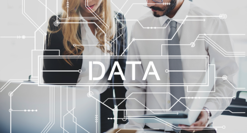 Two professionals with the word DATA and a circuit pattern overlay