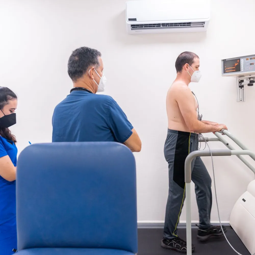 Patient on a treadmill during a cardiac stress test